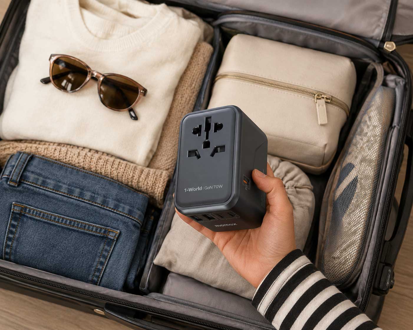 Organized Suitcase with Travel Adapter